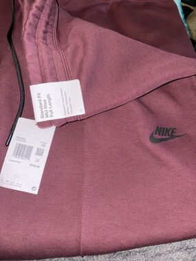 Nike Maroon sweat pants with Black Swoosh